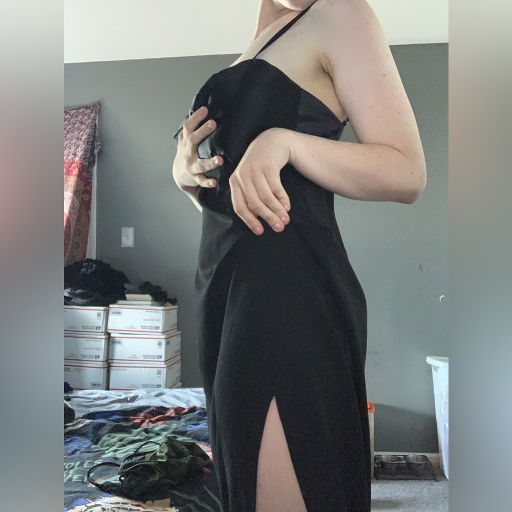 Long black formal dress with slit down leg